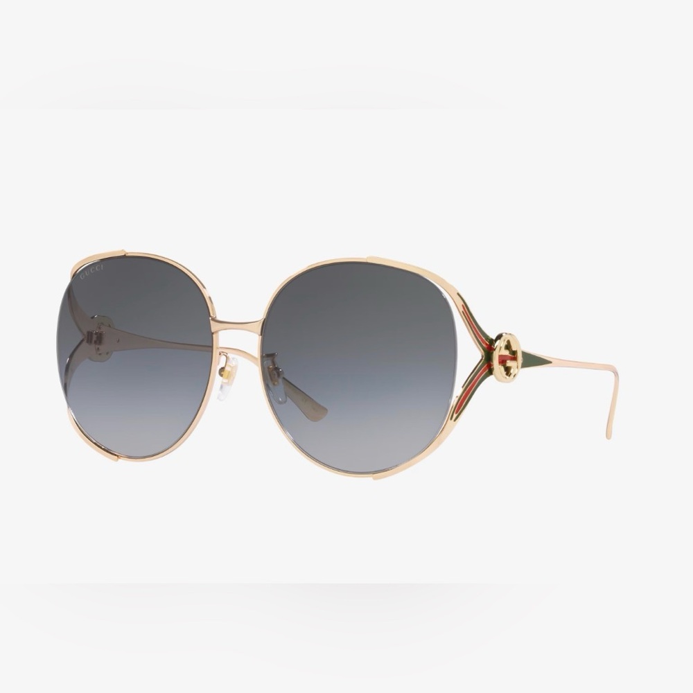 Gucci Women's GG0225S Sunglasses in Gold